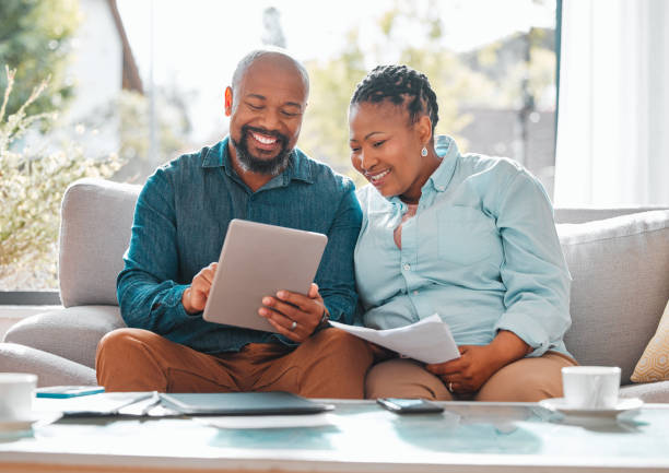 husband and wife checking the app